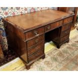 PEDESTAL DESK, Victorian style mahogany with a tooled leather top, 76cm H x 137cm x 75cm.