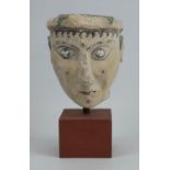 AFTER THE HELLENISTIC MANNER, 'Portrait of a Man', plaster on base, 27cm H.