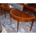 DEMI-LUNE CONSOLE TABLES, a pair, each 128cm W x 74cm H x 64cm D late 19th century George III design