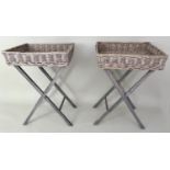 WICKER BASKET CONSERVATORY TABLES, a pair, 66cm x 50cm x40cm. (2)