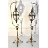 CANDLE LANTERNS, a pair, 163cm H, regency style on stands. (2)