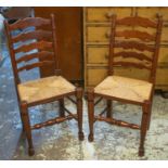 DINING CHAIRS, each 47cm W x 96cm H, a set of six with ladder backs and rush seats. (6)