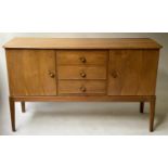 GORDON RUSSEL SIDEBOARD, 1970's walnut with three short drawers flanked by cupboards, 141cm x 49cm x