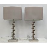 TABLE LAMPS, a pair, 70cm H including shades polished metal pebble design. (2)