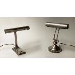 DESK LAMPS, two, early 20th century silvered both with hooded shades, 33cm H and 29cm H