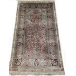 FINE PURE SILK HEREKE DESIGN SILK RUG, 153cm x 92cm.