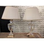 TABLE LAMPS, a pair, 76cm H urn shaped glass, each with tassel twist decoration and a shade. (2)