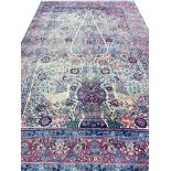 ANTIQUE PERSIAN KERMAN LAVER CARPET, 310cm x 200cm.