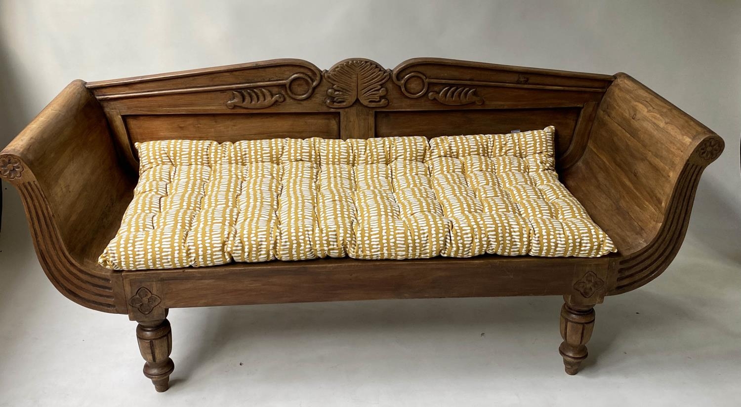 ANGLO-INDIAN BENCH, 168cm W, Colonial style, hand carved teak, with fluted scrolled arms and