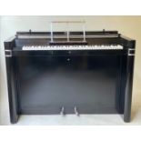 EAVESTAFF MINI PIANO, Art Deco in black lacquered and chrome mounted case, registration NO 12200,