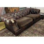 CHESTERFIELD SOFA, 225cm x 71cm H x 102cm, of recent manufacture brown leather with velvet seat.