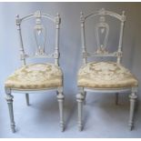 SALON CHAIRS, a pair, French Louis XVI style grey painted with yellow silk damask upholstered seats.