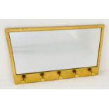 HALL MIRRORS, a pair, each with five coat hooks, gilt metal frames, 41cm x 66cm x 5cm. (2)