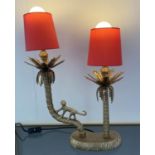 PALM TREES TABLE LAMP, 50cm H with two red shades, with monkey detail.