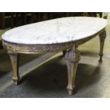 LOW TABLE, 155cm x 59cm x 43cm H, the oval marble top on a gilt base.