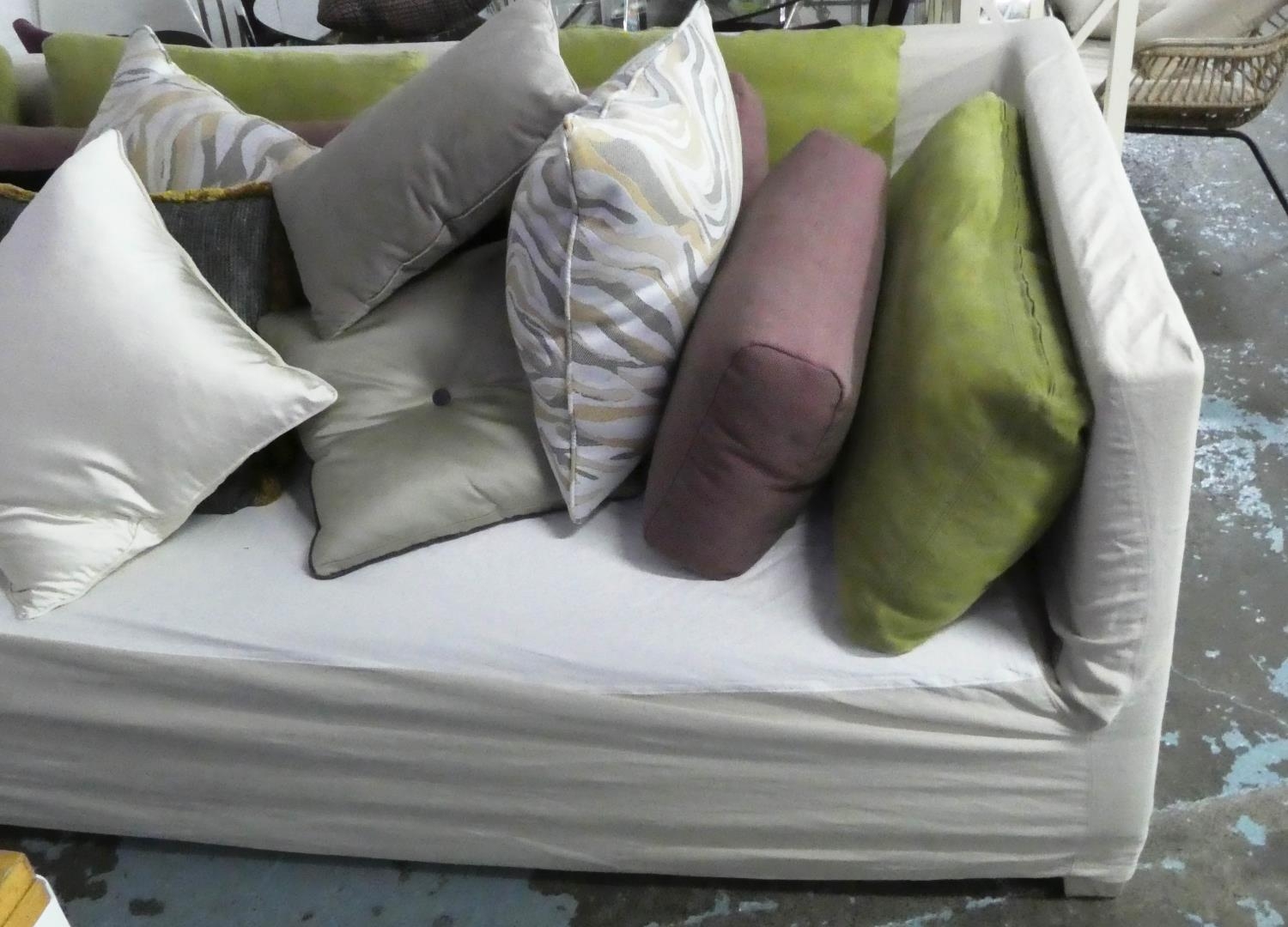 CHRISTIAN LIAIGRE SOFA, 276cm W with various slatter cushions, loose covers. (with faults) - Image 2 of 5