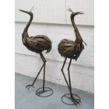 METAL HERONS, a pair, 137cm H.