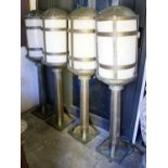 LANTERNS, a set of four, 137cm H x 34cm W, Art Deco bronze, with later perspex shades. (4)