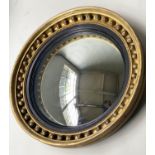 CONVEX WALL MIRROR, Regency giltwood with circular convex plate, ball encrusted frame and ebonised