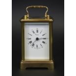 ASPREY 7 JEWEL CARRIAGE CLOCK, 20th century brass, white dial with Roman numerals, engraved to