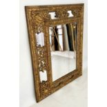 WALL MIRROR, 106cm x 84cm 19th century Dutch repoussé brass with rectangular cushion frame.