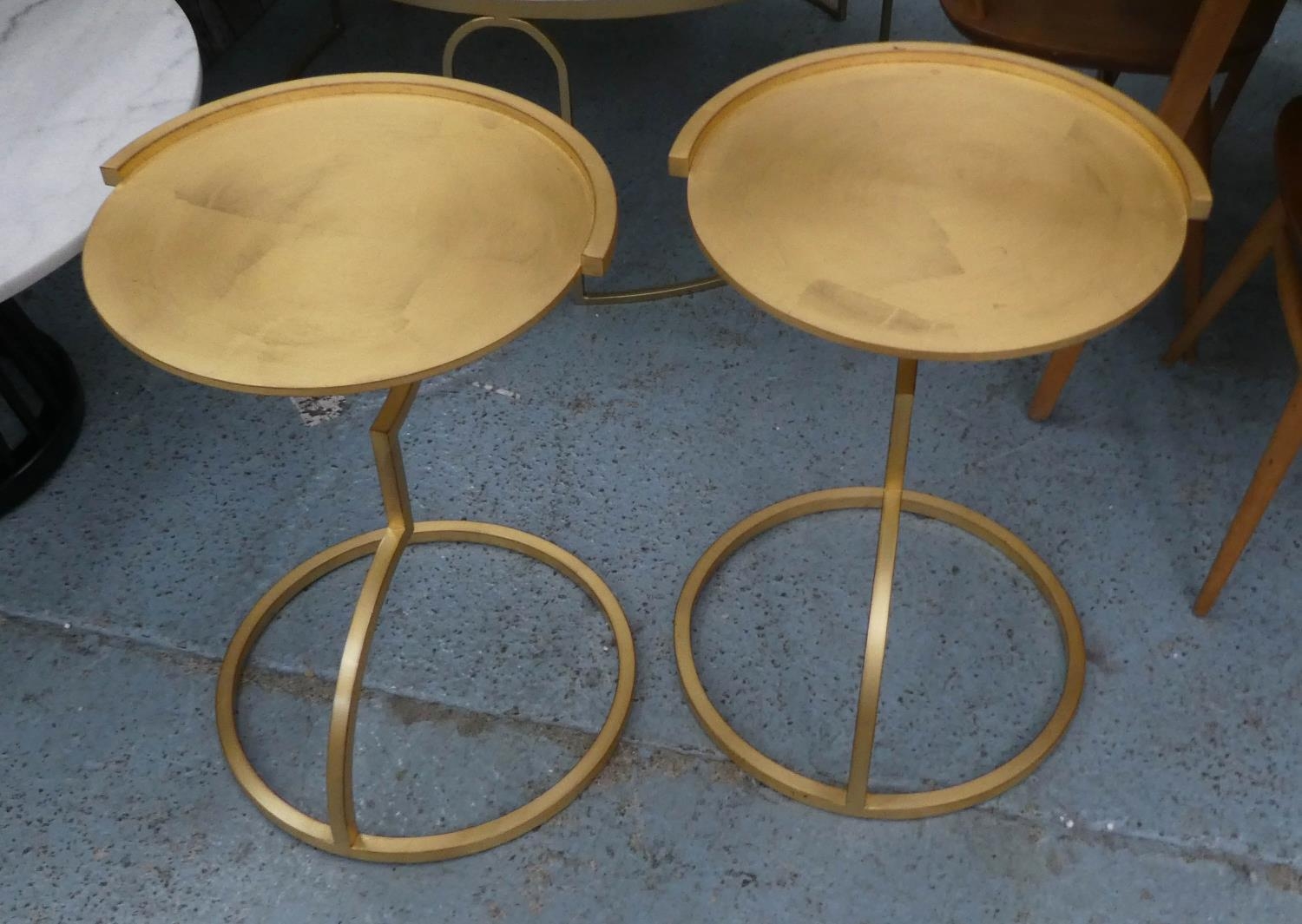 SIDE TABLES, a pair, 61cm x 44cm diam, contemporary, gilt metal. (2)