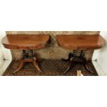 TEA TABLES, a pair, each 92cm x 45cm x 74cm H Regency mahogany with foldover tops on column supports