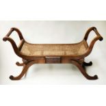 WINDOW SEAT, Anglo Indian teak, Regency style, with scroll supports and cane panelling, 120cm x 40cm