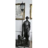 CONTEMPORARY SCHOOL SCULPTURAL LAMP, Resting Man with Dog, 180cm H.