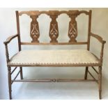 HALL BENCH, early 20th century Edwardian fruitwood with pierced splat backs and studded linen