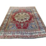 ANTIQUE KERMAN LAVER CARPET, 295cm x 245cm.