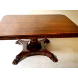 BREAKFAST TABLE, Regency figured rosewood and mahogany crossbanded, with carved pillar and