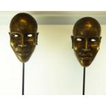 BENIN BRONZE HEADS, a pair, Nigeria, on stands, 35cm H x 19cm. (2)