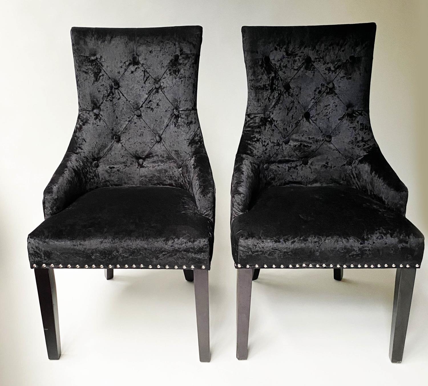 ARMCHAIRS, a pair, button plush black velvet and chrome studded with handle back, 57cm W. (2)