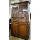 BOOKCASE, 229cm H x 122cm x 40cm, George III mahogany with two glazed doors enclosing adjustable