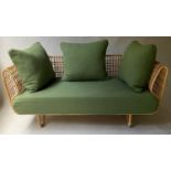 CANE SOFA, rattan, cane and wicker with scroll back and arms, with green cushions by 'Cane Line',
