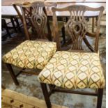 SIDE CHAIRS, a pair, each 58cm W x 94cm H, George III mahogany with needlework stuffover seats and