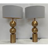 TABLE LAMPS, a pair, 63cm H contemporary gilt metal design, with shades. (2)