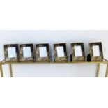 PICTURE FRAMES, a set of six, 26cm x 21cm, Japanese style black and gilt bamboo design. (6)