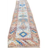 ANTIQUE SERAPI RUNNER, 385cm x 105cm.