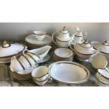 DINNER SERVICE, English fine bone china Royal Doulton, royal gold, 12 place, 5 piece settings,