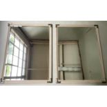 WALL MIRRORS, a pair, rectangular grey painted with bevelled mirror and silvered metal corners, 85cm