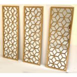 ARCHIECTURAL ACCENT MIRRORS, a set of three, 119cm x 40cm, gilt frames. (3)