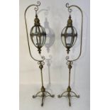 FLOOR STANDING CANDLE LANTERNS, a pair, 163cm H Regency style. (2)