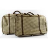 GUCCI VINTAGE SUITCASES, two, circa 1988, monogram canvas with brown leather trims and handle,