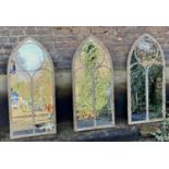 ARCHITECTURAL GARDEN WALL MIRRORS, a set of three, 122cm x 56cm, aged metal frames. (3)
