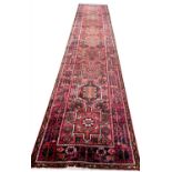 FINE PERSIAN KARAJA RUNNER, 465cm x 90cm.