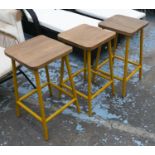BAR STOOLS, a set of six, 66cm H, vintage style, machinists design, yellow metal supports. (6)