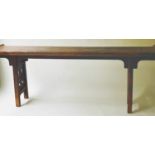 SCRIBES TABLE, Chinese firwood with traces of scarlet lacquer and trestle supports, 222cm x 38cm x