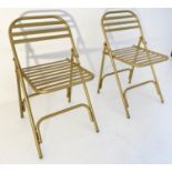 TERRACE CHAIRS, a pair, 76cm x 44cm x 45cm, 1950's French style, gilt metal. (2)